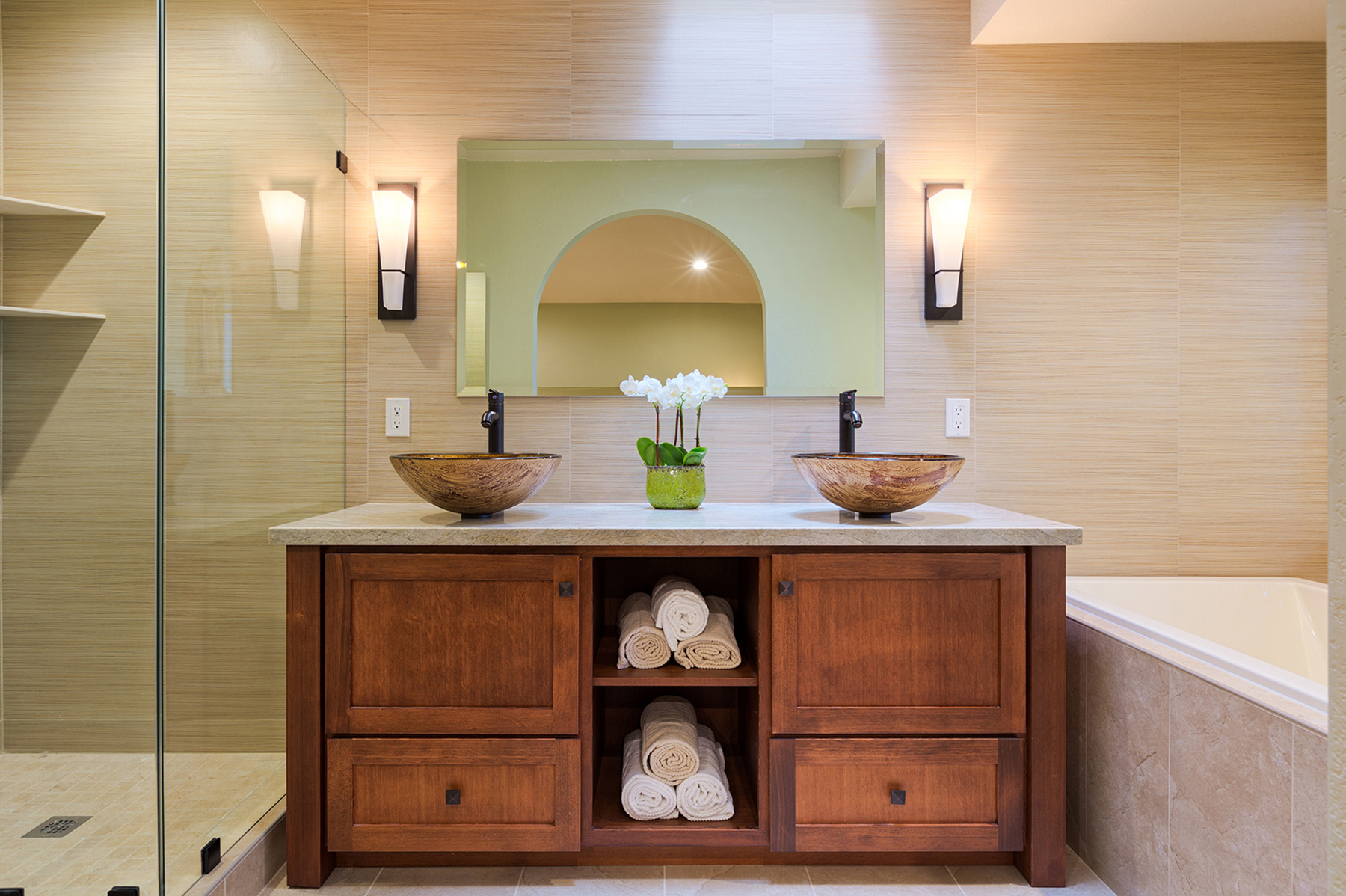 Award-winning Japanese-inspired bathroom designed by Yoko Oda Interior Design featuring natural wood, stone, and minimalist details